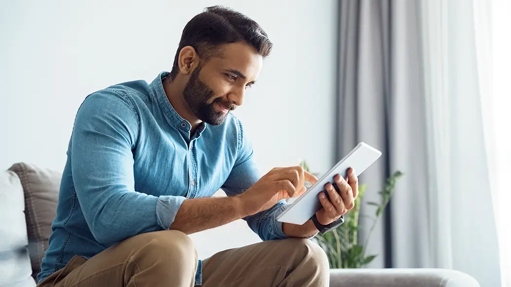 man with ipad